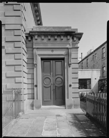 Closed door on side of building